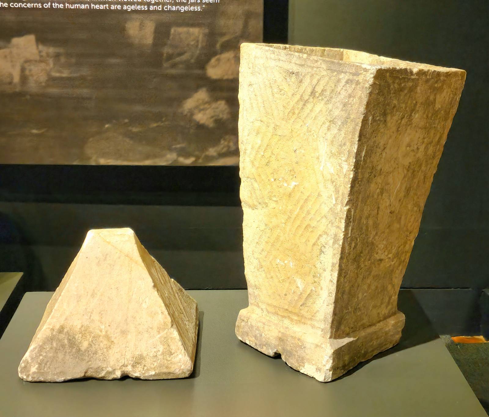 limestone burial jar with its lid that is non-anthropomorphic.